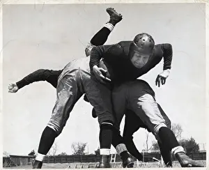 Tackle Prints: Football Player Bring Tackled