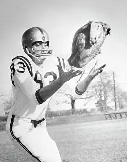 Football Player Catching Turkey