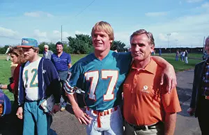 Football Player with Coach