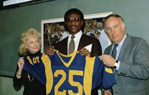 Anaheim Prints: Football Player Eric Dickerson Posing with Ram's Owner and Coach