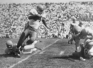 Lawrence Prints: Football Player Escaping Tackle