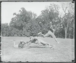 College Student Prints: Football Player Escaping Tackle
