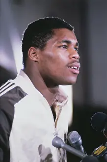 Football Player Herschel Walker at Microphones