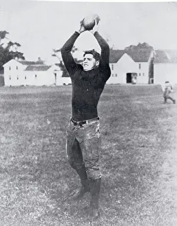 Detroit Prints: Football Player Holding Ball