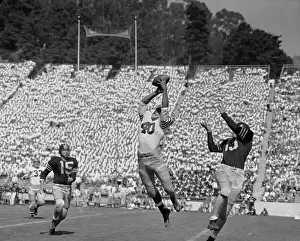 Berkeley Prints: Football Player Intercepting a Pass