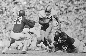 Football Player Jim Brown Tackling Halfback