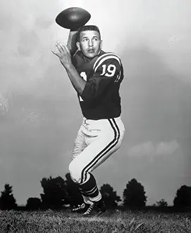 Football Player Johnny Unitas Throwing a Football