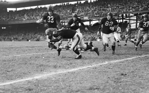 Football Uniform Prints: Football Player Sammy Baugh Getting Tackled