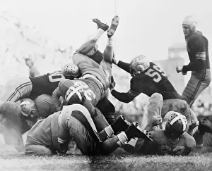 Football Player Scoring a Touchdown