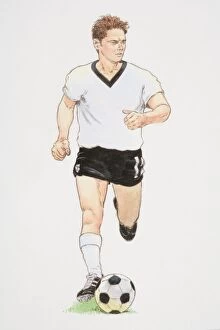 Soccer Gallery: Football player in white T-shirt and black shorts running with football in front of him, front view