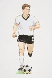 Football player in white T-shirt and black shorts running with football in front of him, front view