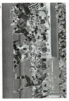 Football Players in Desperate Action