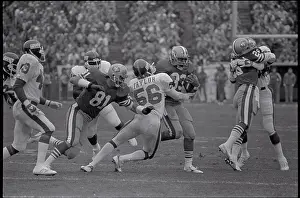Football Players in Fast Action