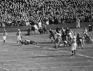 Football Players on The Field During Game