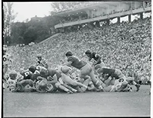 Football Players Piled Atop One Another