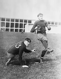 Football Players Practicing Place Kicking
