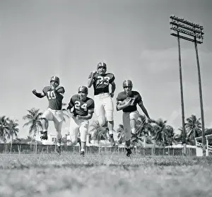 Football Players Running