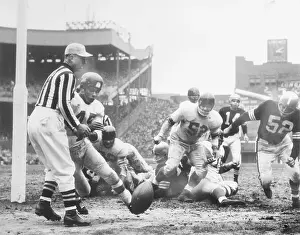 Defensive Back Prints: Football Players Running for Fumble