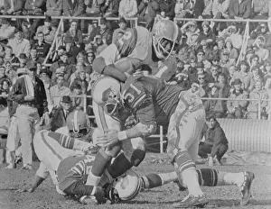 Football Players Tackling Cookie Gilchrist