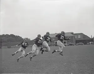 Football Players Working out on Field