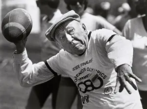 Active Seniors Prints: Football Thrower in Senior Olympics