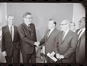 Ford Motor Company and United Auto Workers Shaking Hands