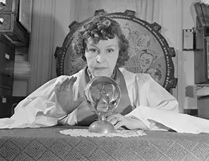 Future Prints: Fortune Teller Gazing into Ball on Table