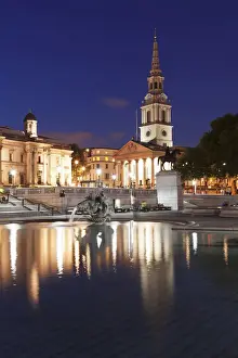 Fountain with equestrian statue of George IV in front of the National Gallery and Church of St Martin-in-the-Fields, Trafalgar Square, London, England, United Kingdom