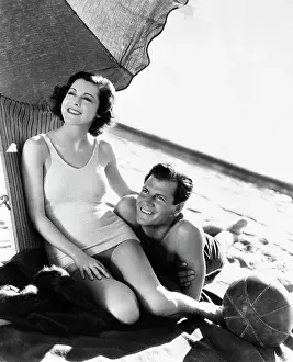 Newlyweds Prints: Frances Dee And Joel McCrea On Beach