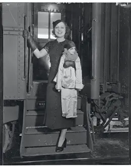 Frances Drake Disembarking Train