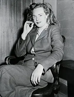 Arresting Prints: Frances Farmer Seated, Smoking Cigar