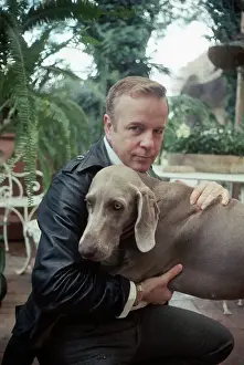 Franco Zeffirelli In Garden With His Dog