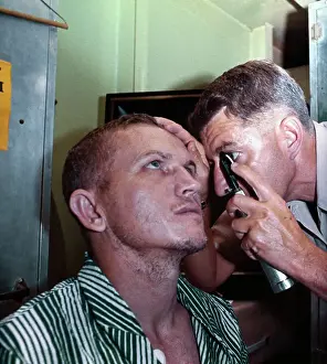 Frank Borman Having Eye Exam