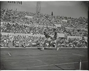 Frank Budd Passing Baton to Ray Norton