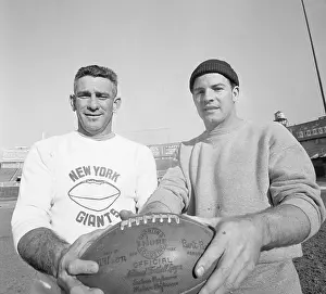 Frank Gifford and Chuck Conerly Holding Football