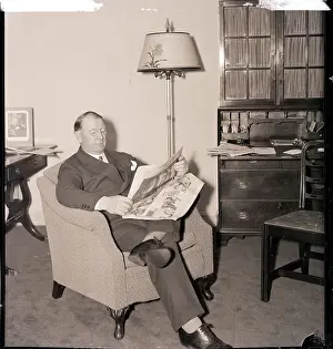 Legs Crossed Prints: Frank Knox Reading Newspaper