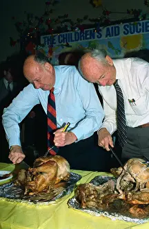 Frank Perdue and Ed Koch Carving Turkeys