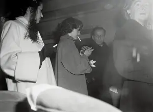 Frank Sinatra Helping Ava Gardner