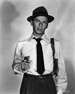 Frank Sinatra in Publicity Photo Holding Gun