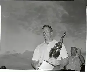 Frank Stranahan Holding Trophy