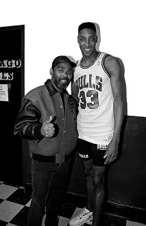 Prints of CHICAGO - APRIL 1990: Singer Frankie Beverly of Maze featuring Frankie Beverly poses for photos with Chicago Bulls basketball player Scottie Pippen after the Bulls game Courtside Vibes: Stunning Basketball Prints: Frankie Beverly At Chicago Stadium