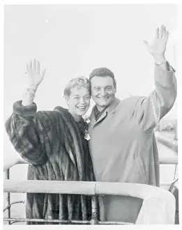 Frankie Laine and Wife Waving From Ship