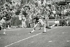 Fred Bilentnikoff Being Tackled by Goldie Sellers