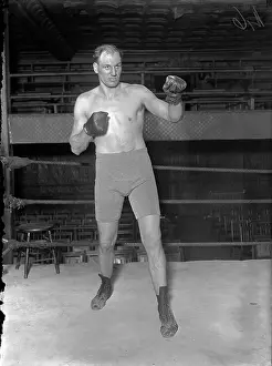 Prints of 1923: Heavyweight boxer Fred Fulton in a fight pose while training for his bout with Floyd Johnson, circa 1923. (Photo by The Stanley Weston Archive/Getty Images) In the Ring: The Art of Boxing: Fred Fulton