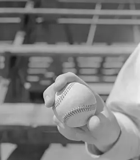 Fred Hutchinson's Hand Clutching Baseball