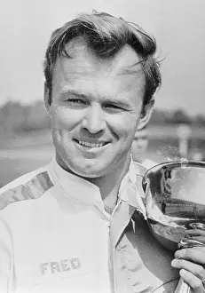 Charlotte Prints: Fred Lorenzen Holding one of His Trophies