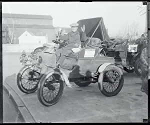 Fred Parson Driving His Winston Car