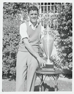 Fred Webb Posing With Trophy