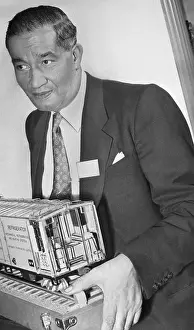 Refrigerator Prints: Frederick McKinley Jones Holding Model Train Car