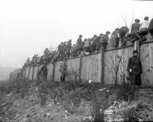 Cities Prints: Free football spectators on a fence